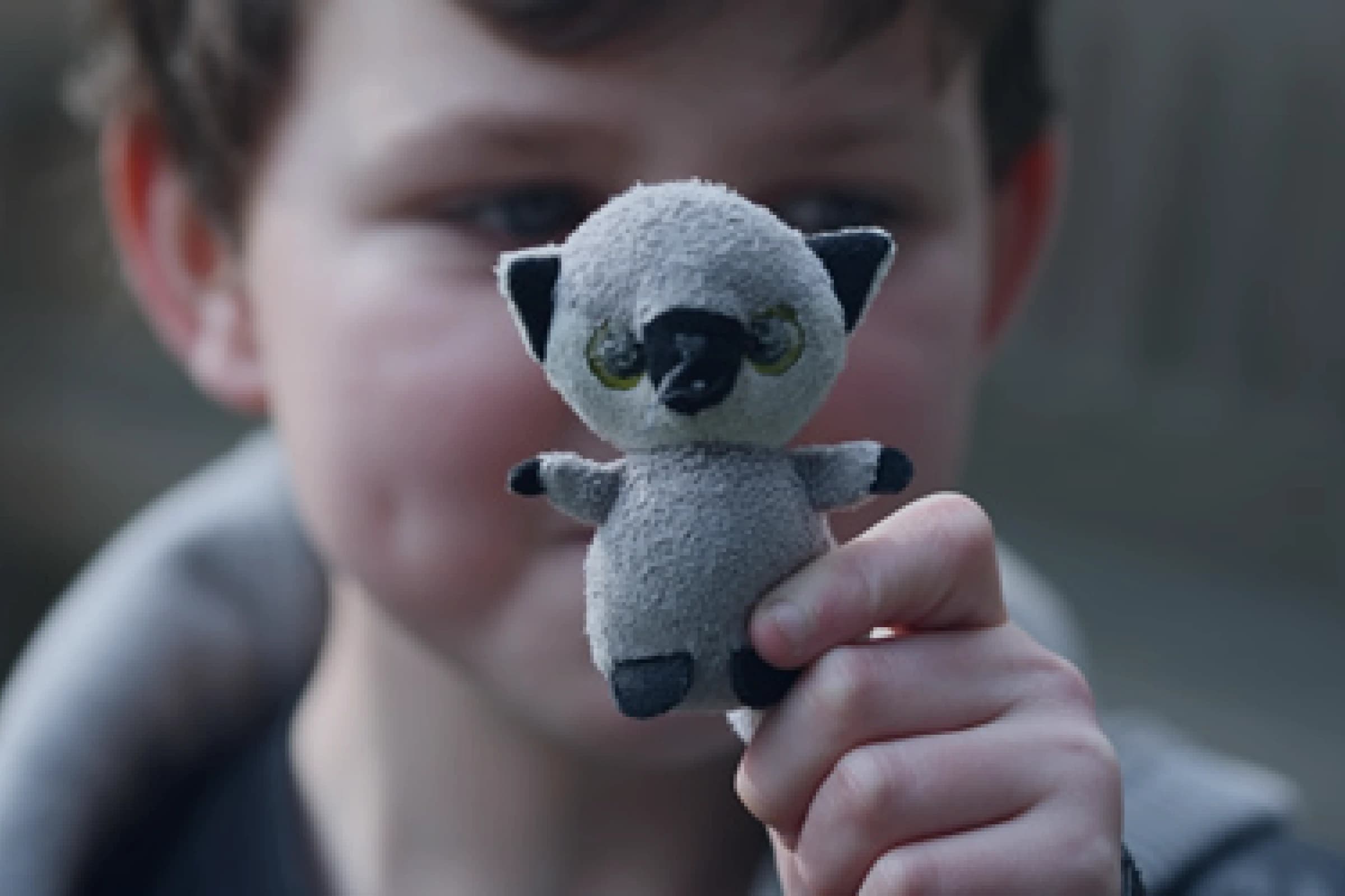 Child with Barth Syndrome holding a toy