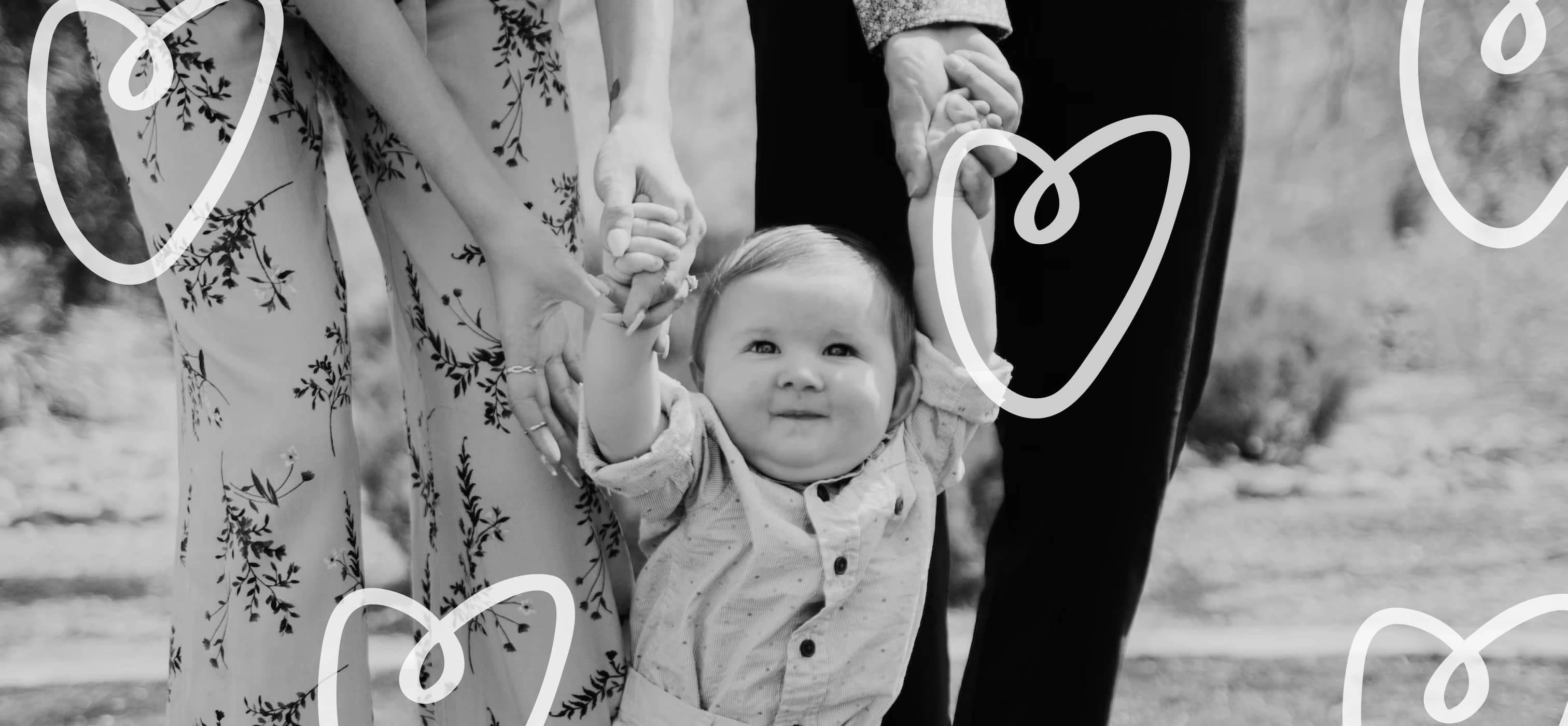 Baby with Barth Syndrome being held up by his parents